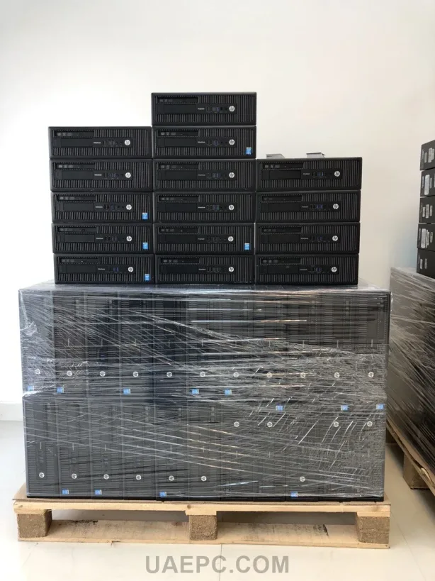 bulk-mini-desktop-pcs-stacked-in-warehouse-gallery - desktop-computers-gallery